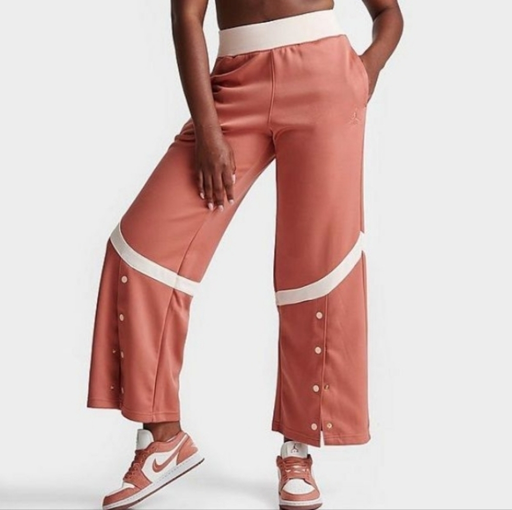 Nike Jordan Women's (Her)itage Track Suit Pants in Sky J Orange